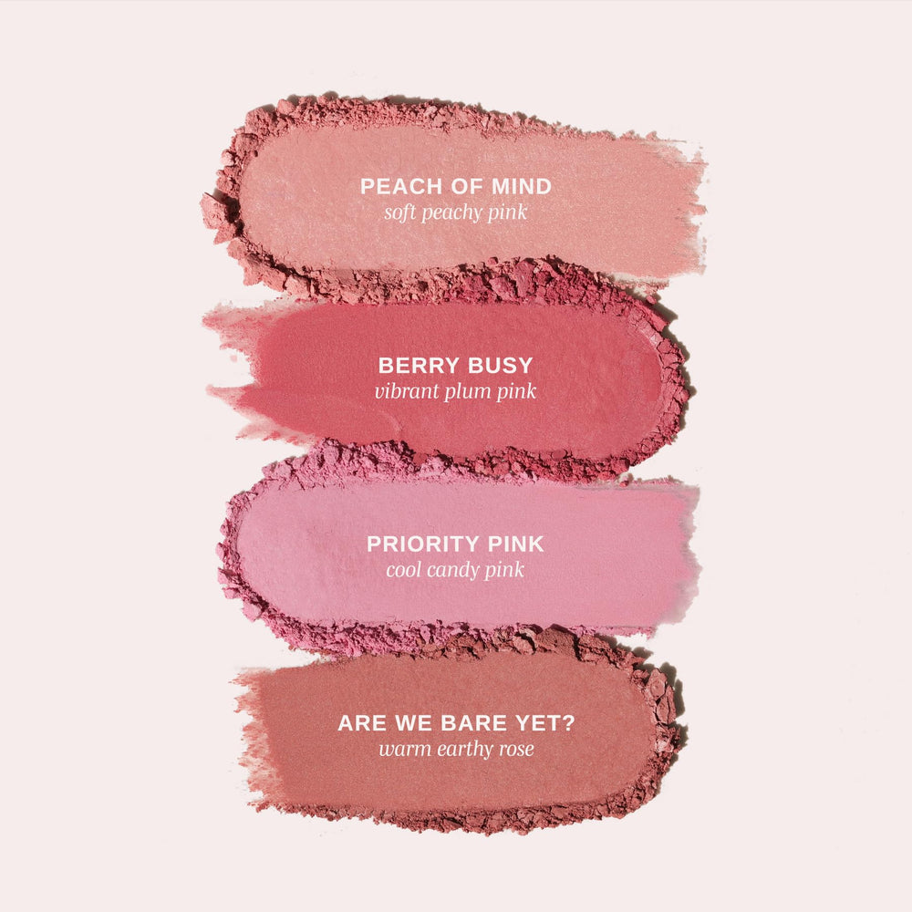 Wander Beauty Berry Busy compact open with included brush for easy application.