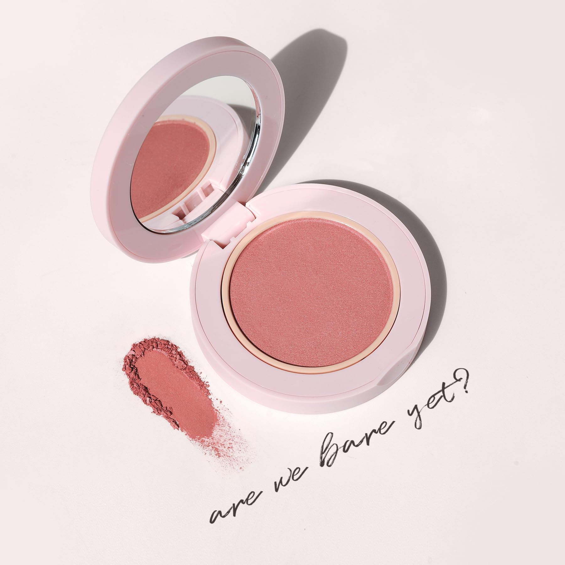 Wander Beauty Hydrating Powder Blush compact close-up demonstrating blendable color