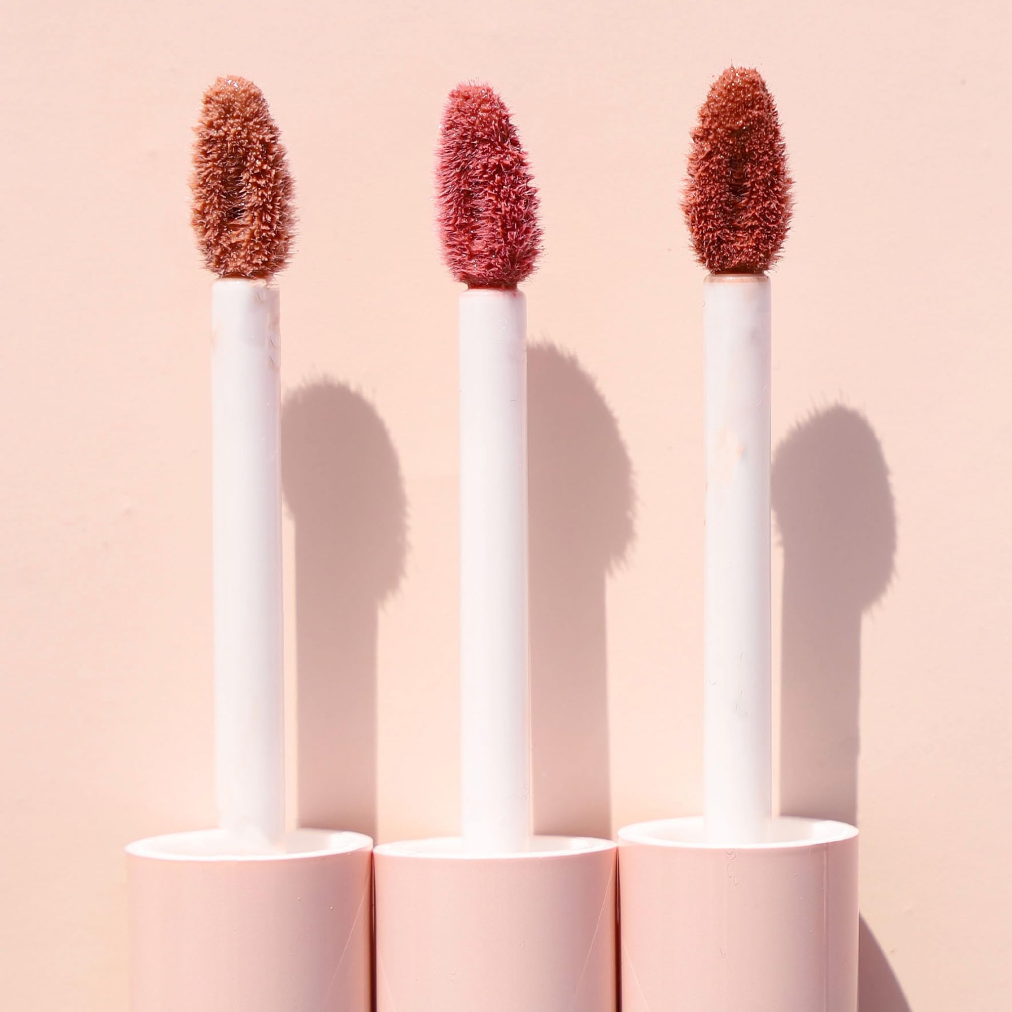 Wander Beauty Lip Retreat Oil Tan Lines travel-friendly tube for on-the-go moisture.