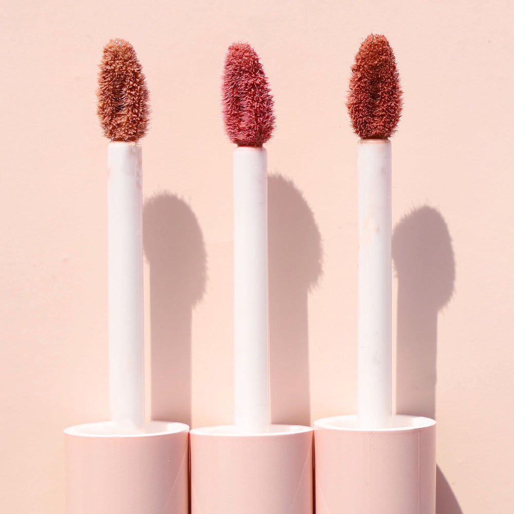 Wander Beauty Lip Retreat Oil Tan Lines travel-friendly tube for on-the-go moisture.
