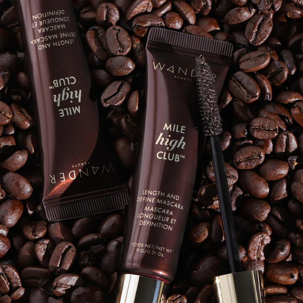 Wander Beauty Mile High Club mascara testing water-resistance for all-day wear.