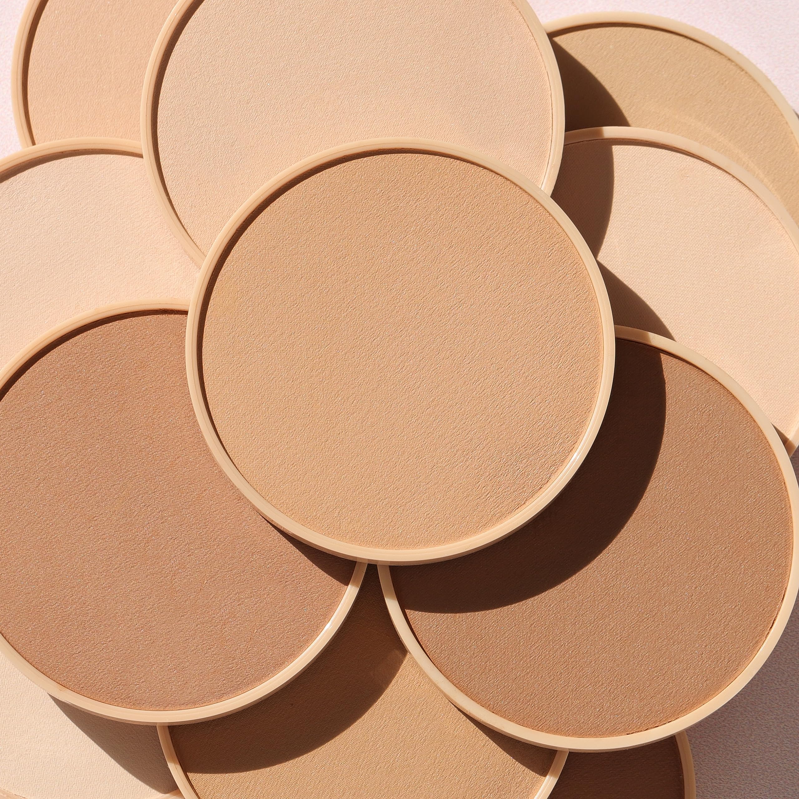 Wander Beauty Wanderlust Powder Foundation application with brush for buildable coverage