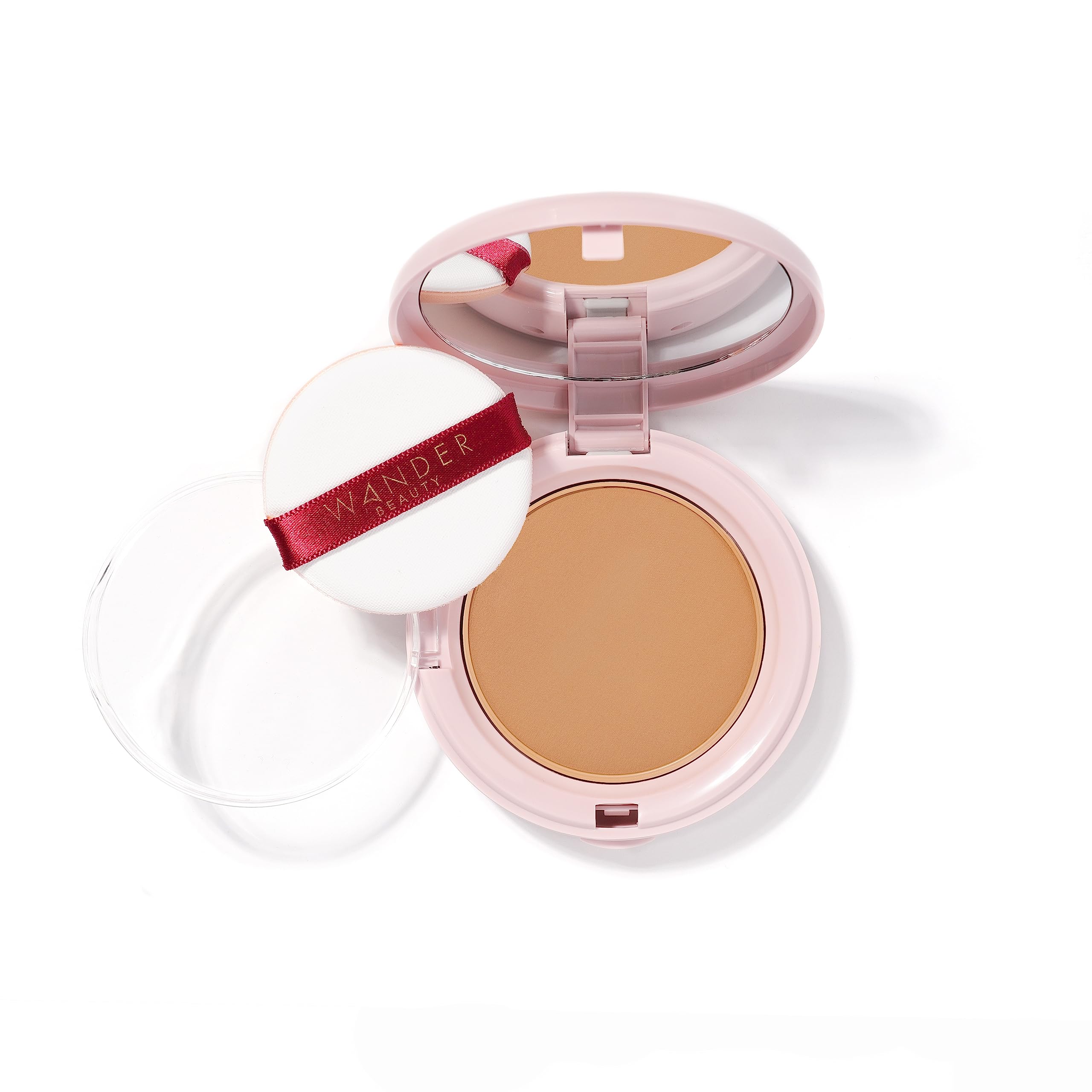 Wander Beauty Wanderlust Powder Foundation Rich compact open shows silky texture for a natural finish.