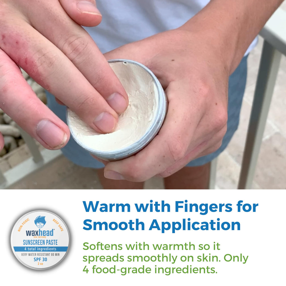 Applying the paste by warming fingertips for even coverage on skin.