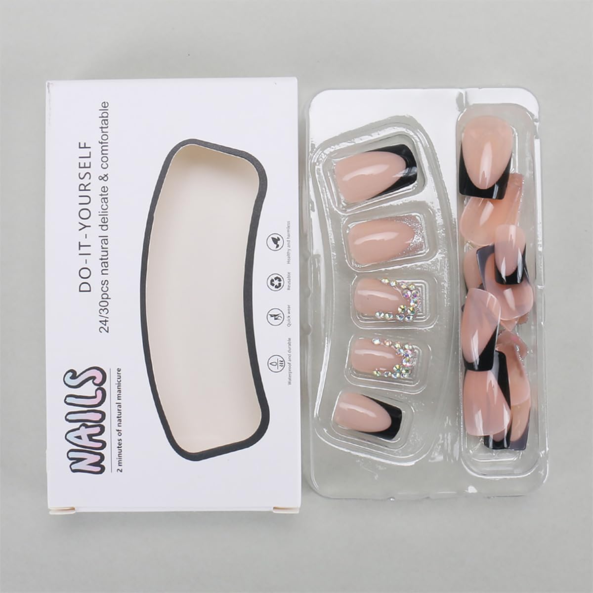 WBRRFJJ nude-base tips with black tips and rhinestones for elegant style.
