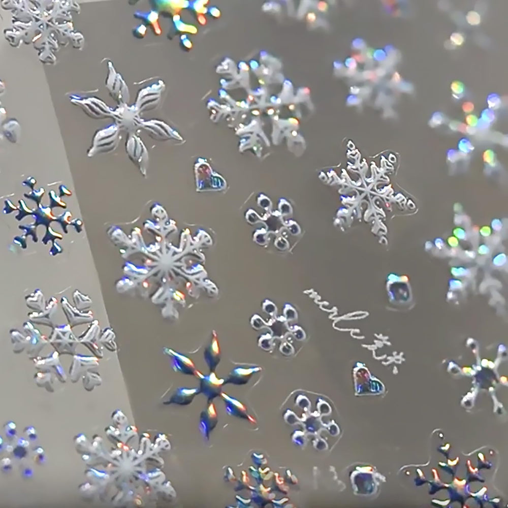 WBRRFJJ 5D embossed Christmas snowflake stickers close-up for festive nails.