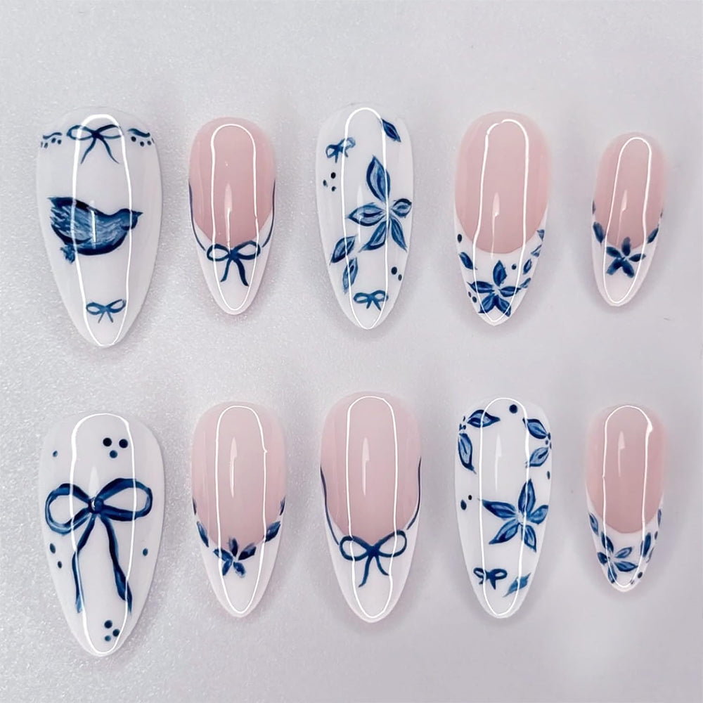 WBRRFJJ blue flower press-on nails with bow design for quick glam manicures.