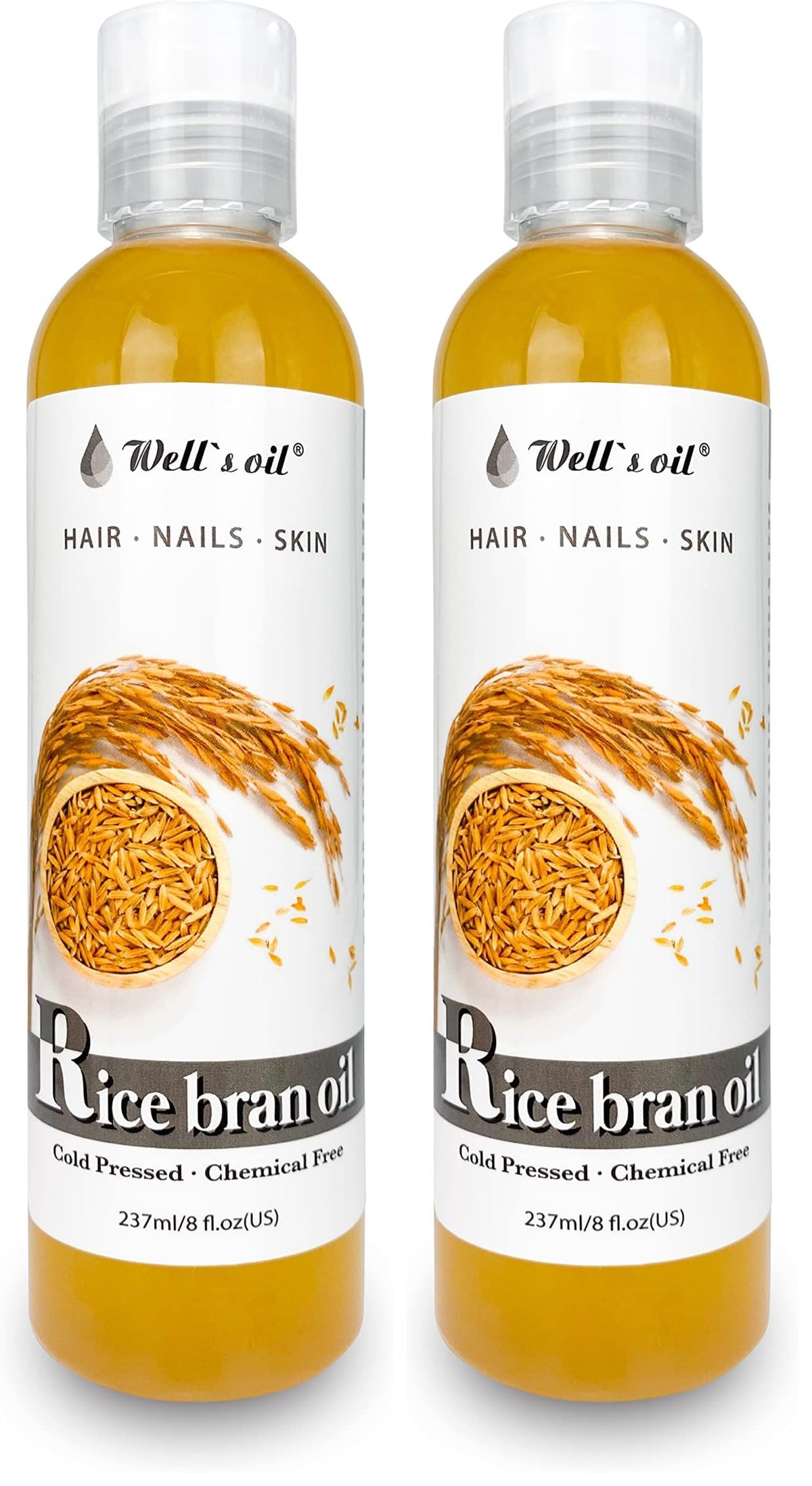 Well's Oil Rice Bran Oil bottle shows pure carrier oil for face, body, and hair.