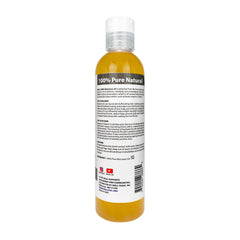 Well's Oil Rice Bran Oil pour demonstrates easy application and quick absorption.