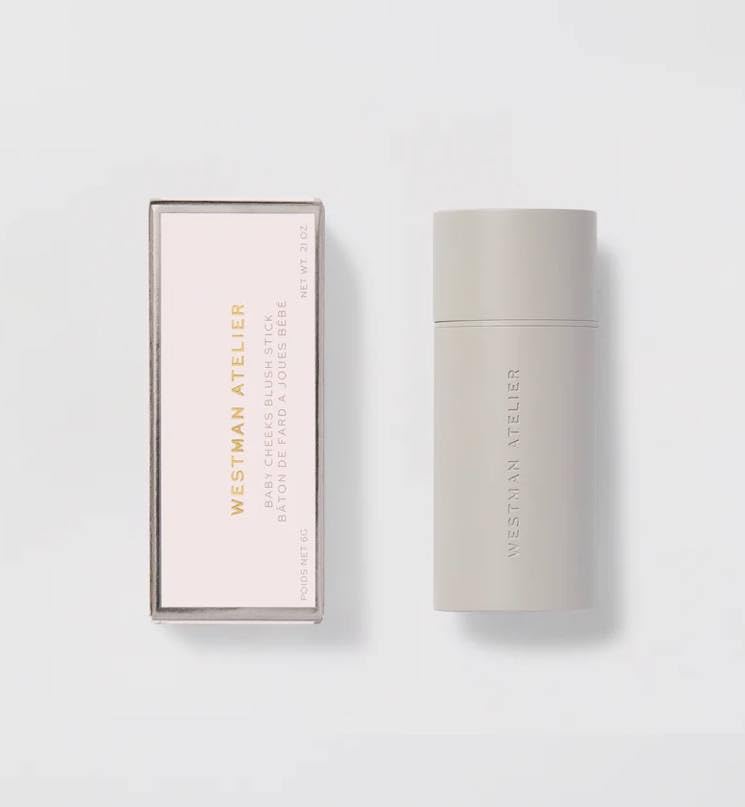 Application of Westman Atelier Baby Cheeks Blush Stick Coquette on cheek for glow