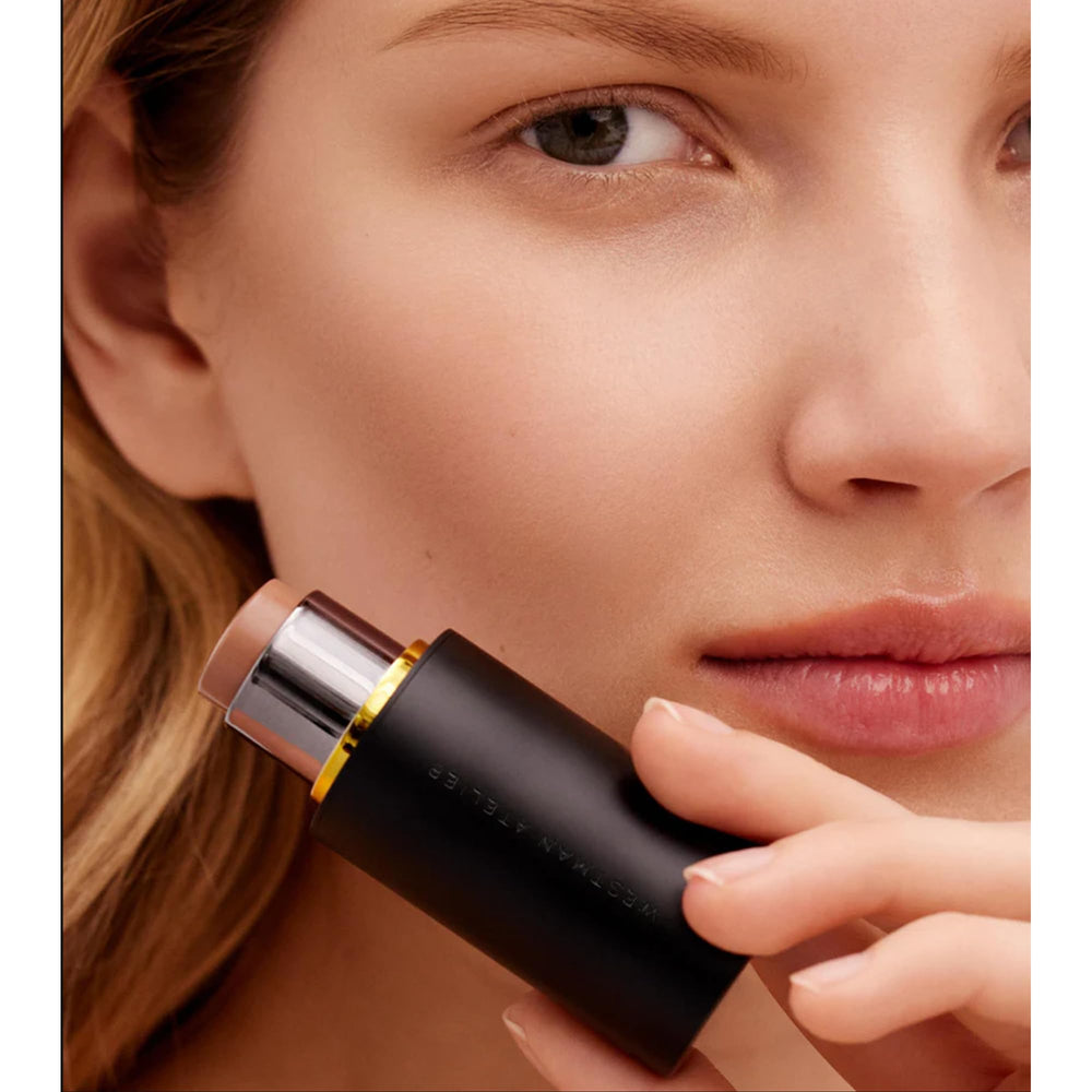 Close-up of Biscuit contour on cheek for subtle lift and definition.