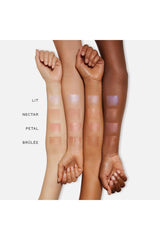 Westman Atelier Lit Up Glow Highlighter Stick Nectar for on-the-go touch-ups and radiance.