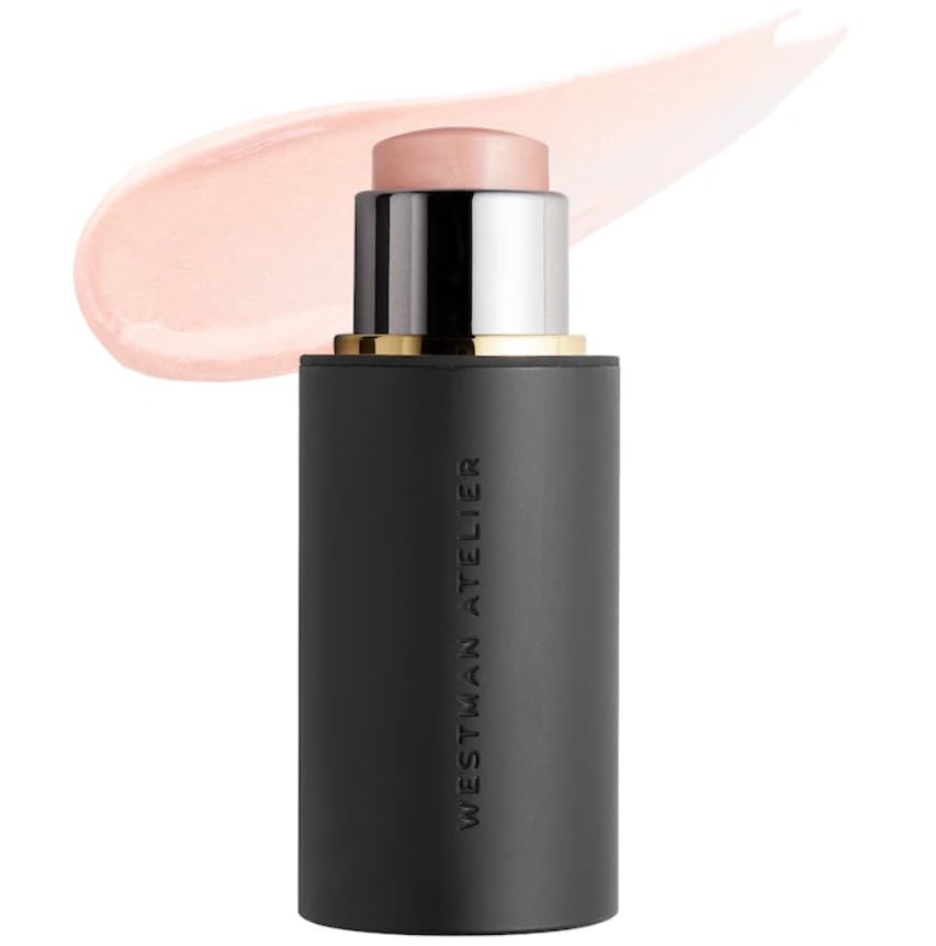 Westman Atelier Lit Up Nectar highlighter on cheekbones for a dewy glow
