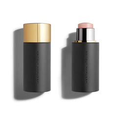 Westman Atelier Lit Up Nectar highlighter applied to tear ducts brightens the eye area