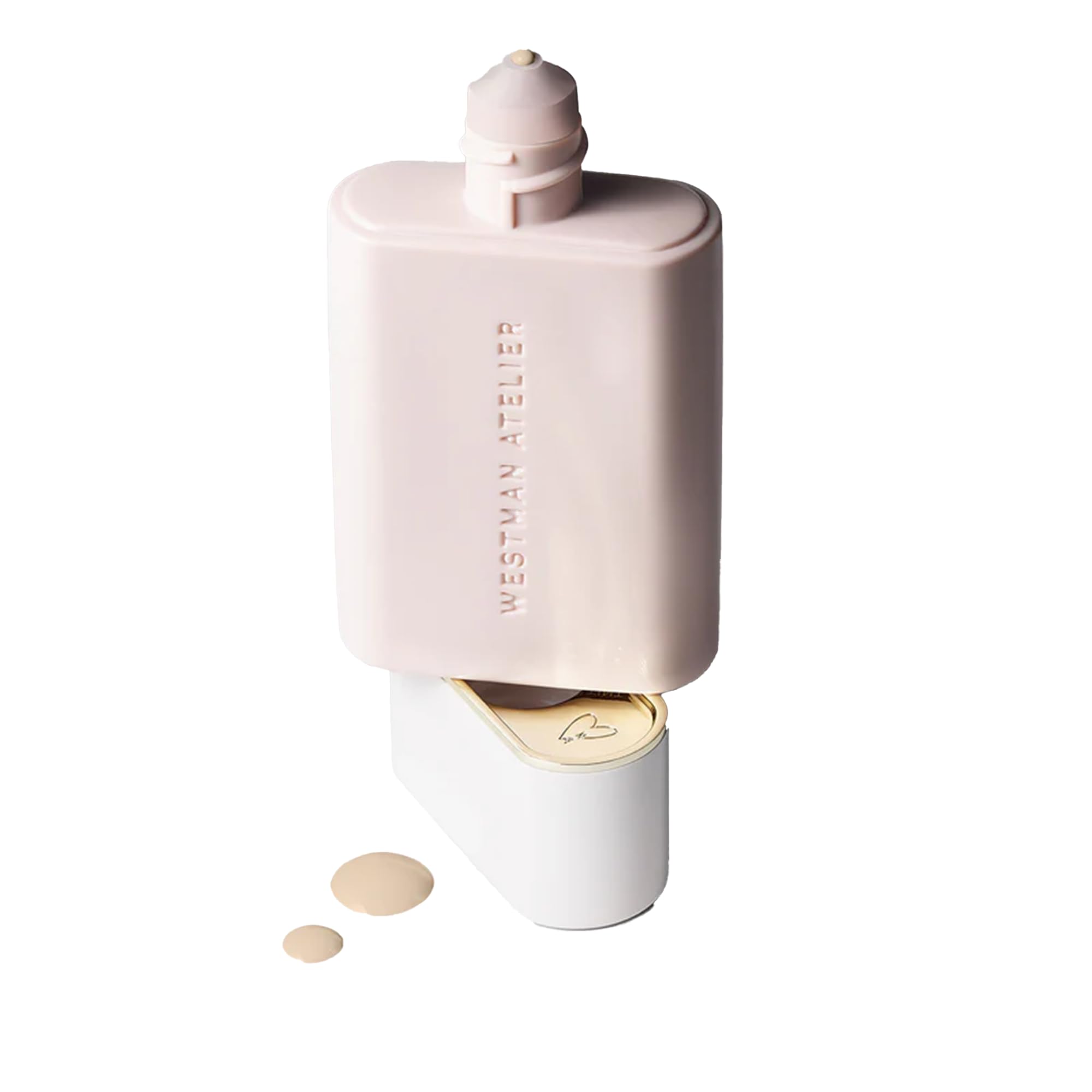 Westman Atelier Vital Skincare Complexion Drops bottle on vanity with soft glow