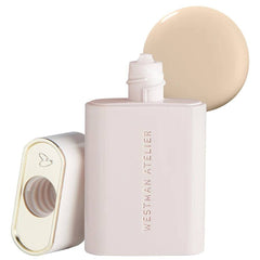 Westman Atelier Complexion Drops Atelier 0.5 bottle pour hydrates and evens skin tone for radiant results.