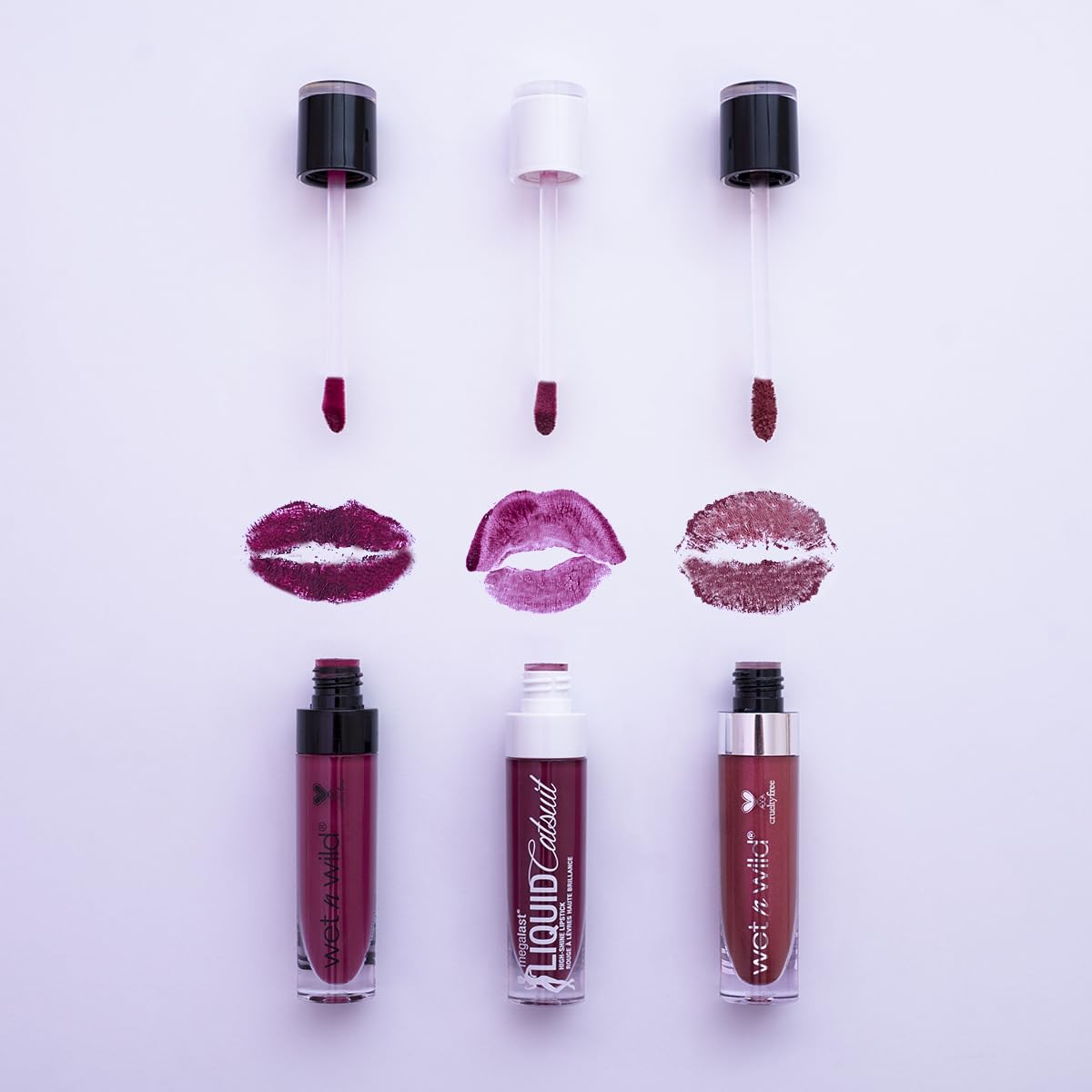 wet n wild Megalast Catsuit Matte Lipstick showcases red berry shade on lips