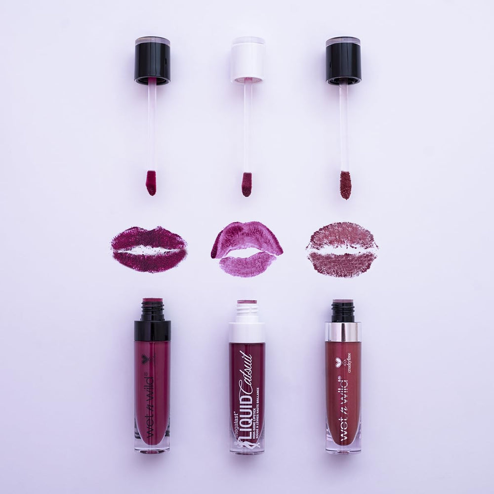 wet n wild Megalast Catsuit Matte Lipstick showcases red berry shade on lips