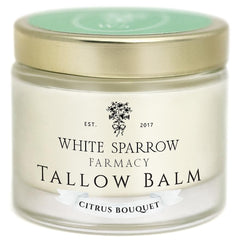 White Sparrow Farmacy Citrus Balm bottle offers instant skin hydration.