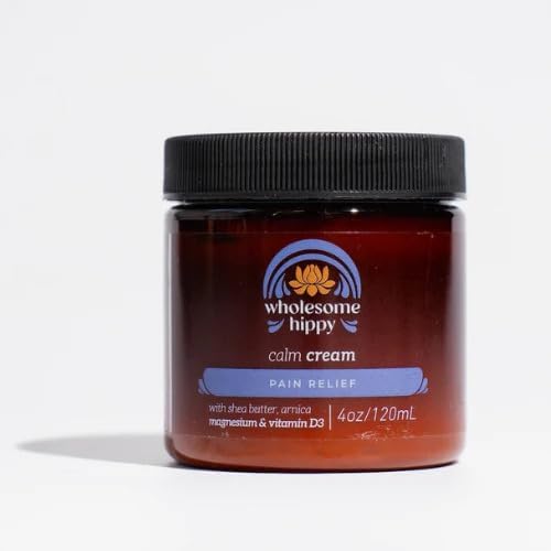 Applying Wholesome Hippy Magnesium Calm Cream to skin for calming relief.