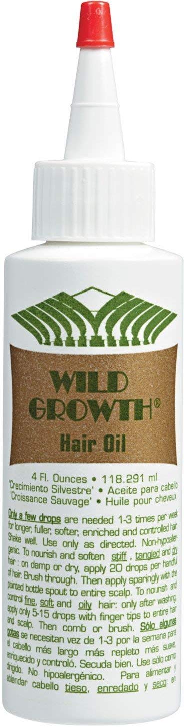 Wild Growth Virgin Hair Fertilizer being applied to the scalp for growth support.