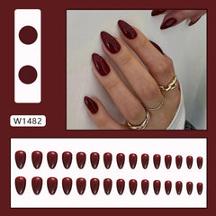 Glossy wine red press-on nails ready for events with instant glam