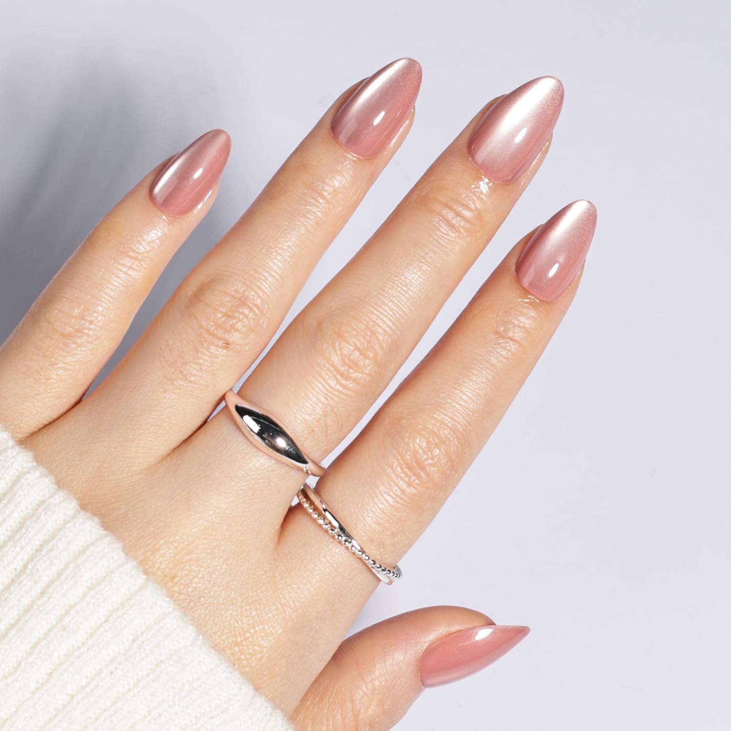 WiniBeauty cat eye press on nails mauve short almond kit for a quick manicure.