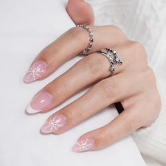 WiniBeauty French-tip snowflake design nails for festive looks