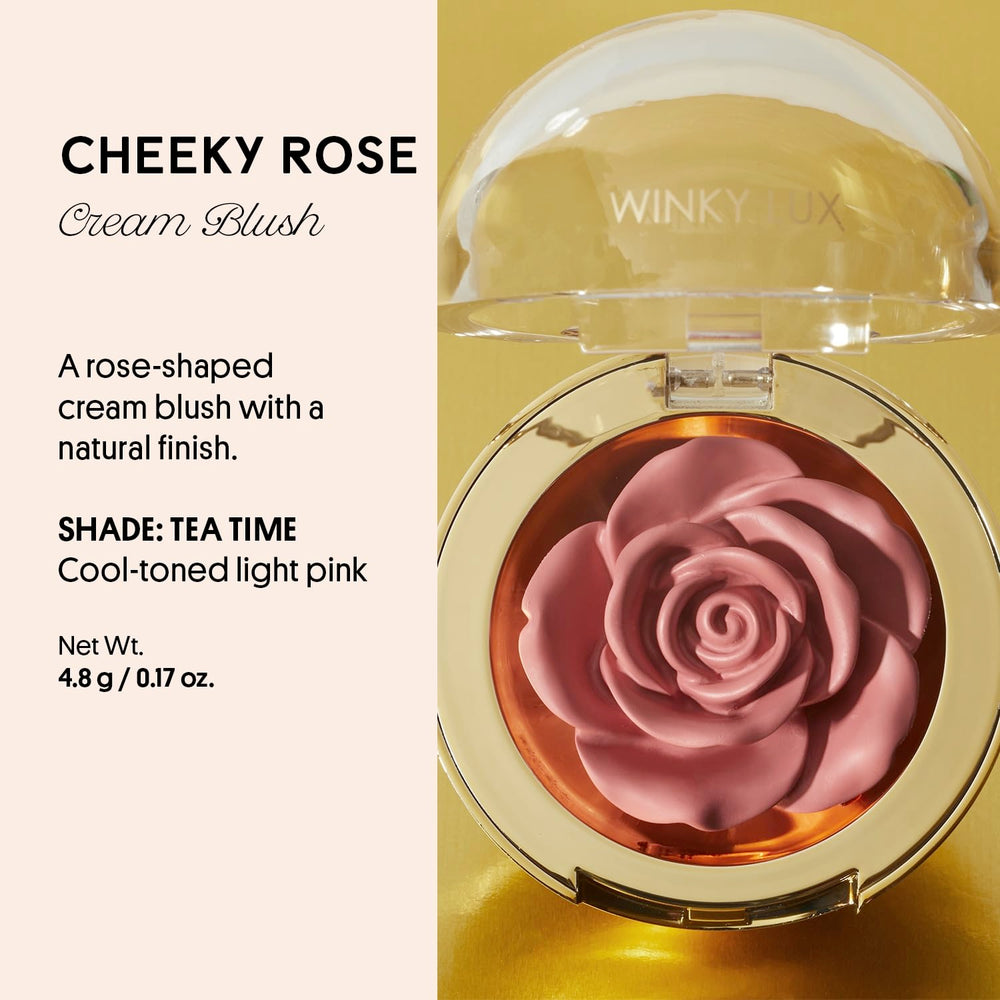 Winky Lux Cheeky Rose Cream Blush swirled on finger, showing smooth, blendable texture.