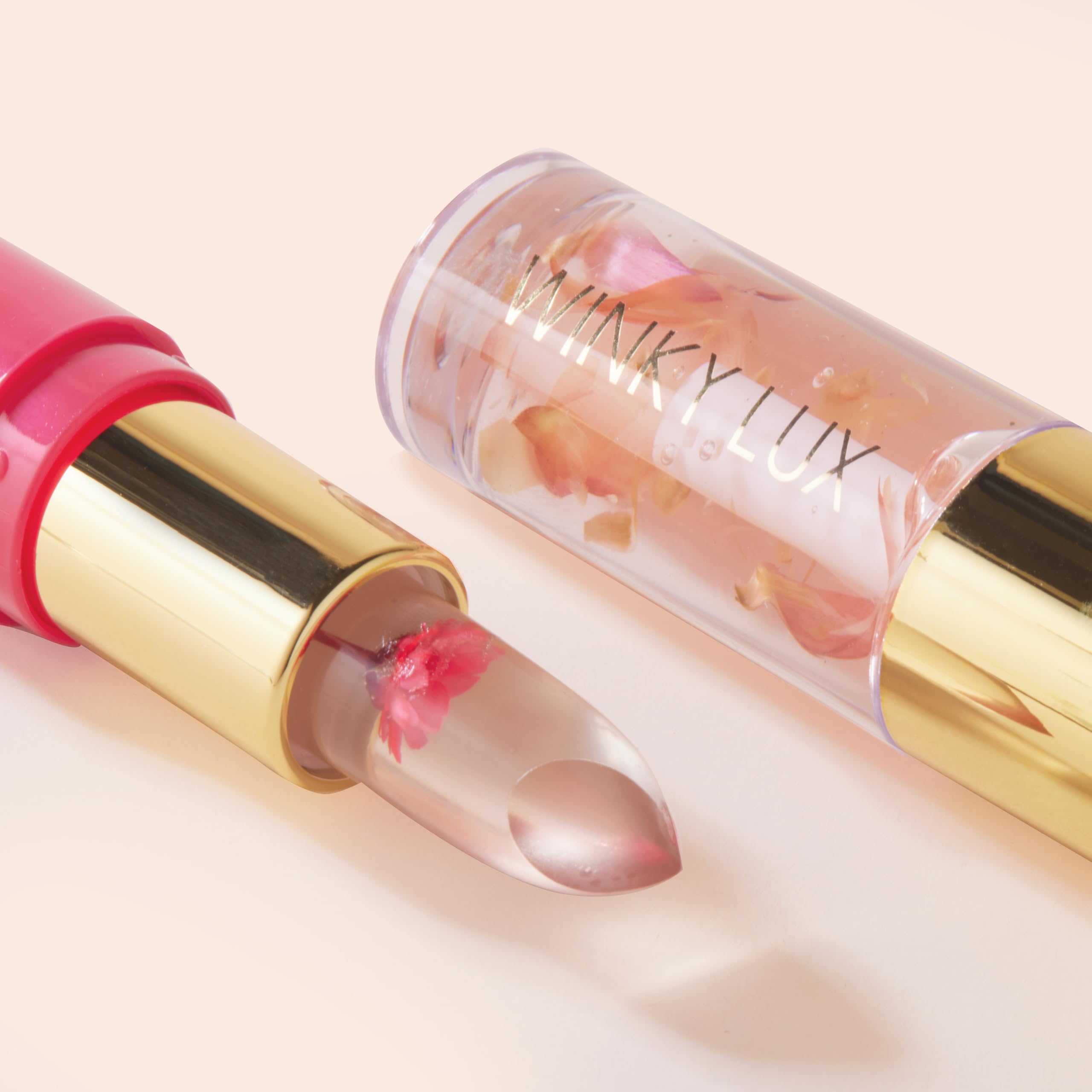 Winky Lux Glassy Lip Oil provides a mirror-like shine with lightweight texture.