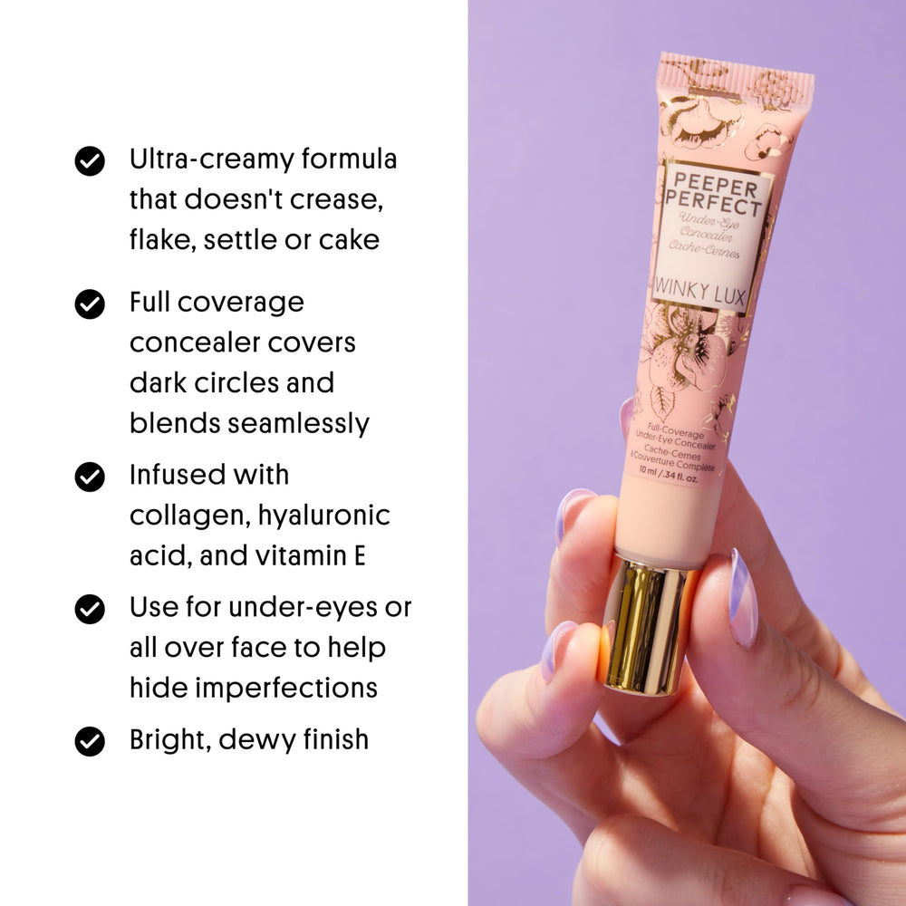 Applying Winky Lux Peeper Perfect under-eye concealer to reduce redness and even skin tone.