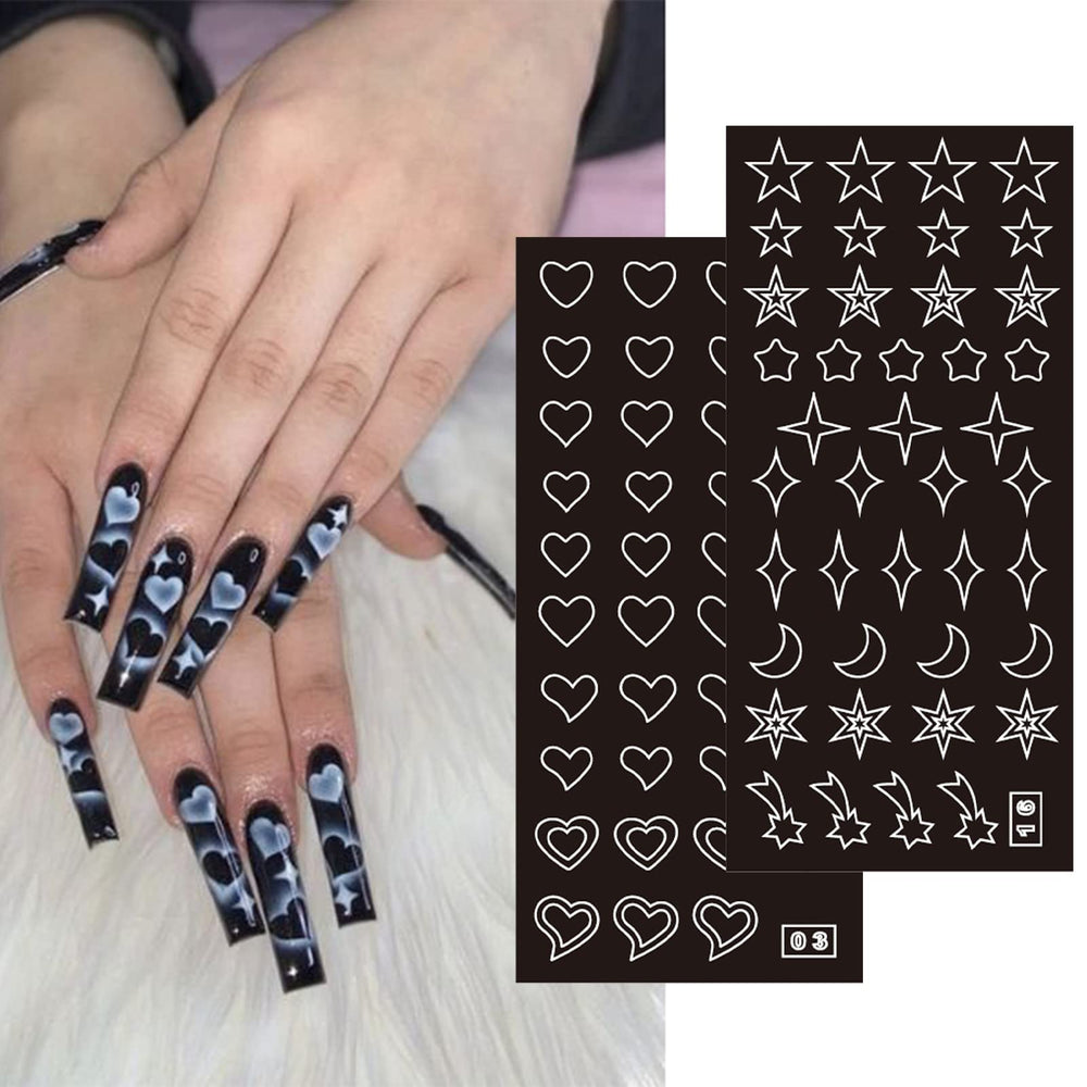 Winthrop butterflies flames nail art stencils for dramatic accents in DIY manis.