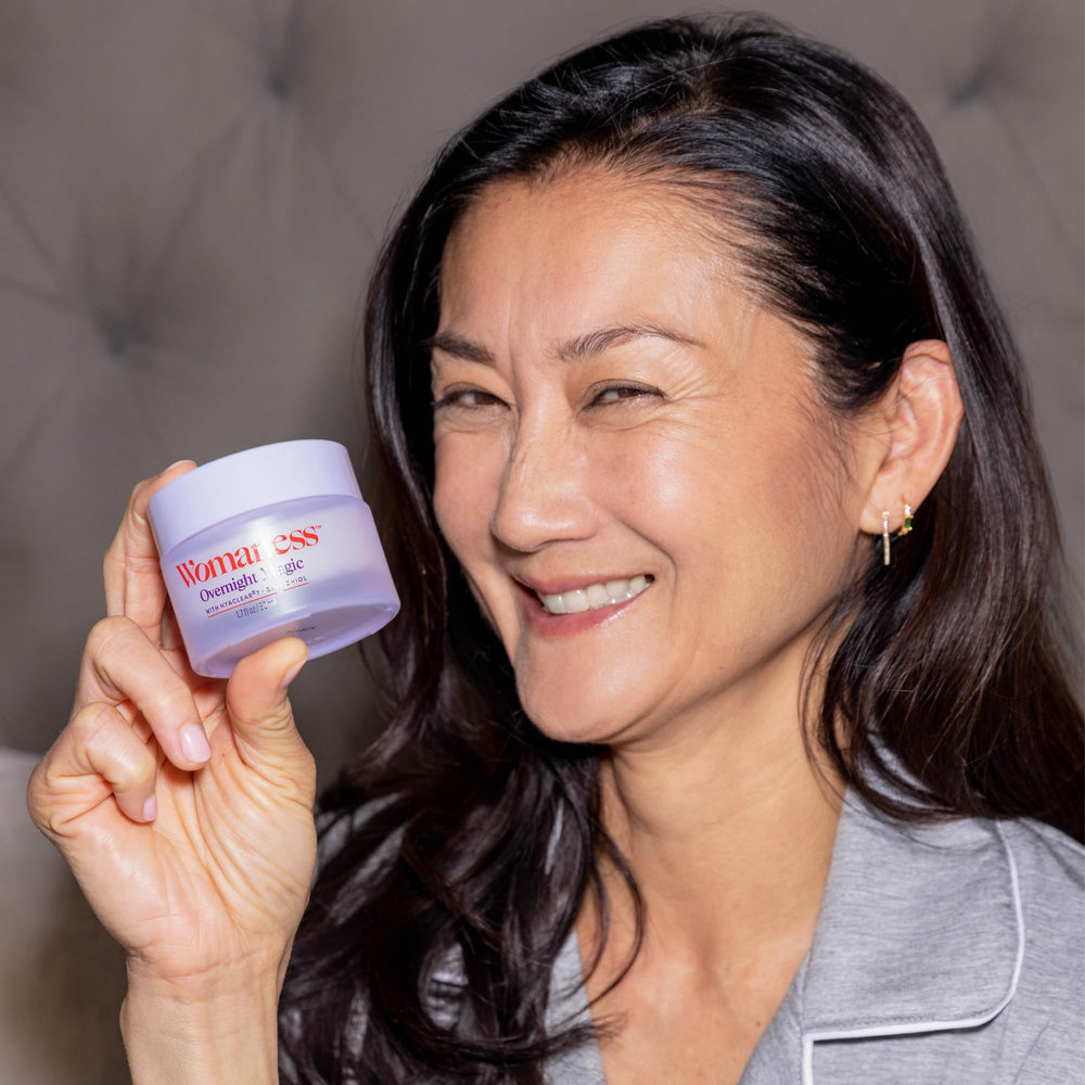 Nighttime skincare routine setup with Womaness by bedside