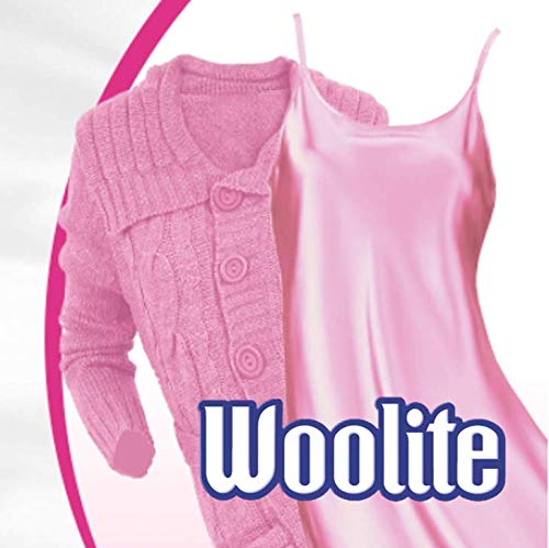 Woolite Hand Wash pour showing controlled dispensing for delicate garments.