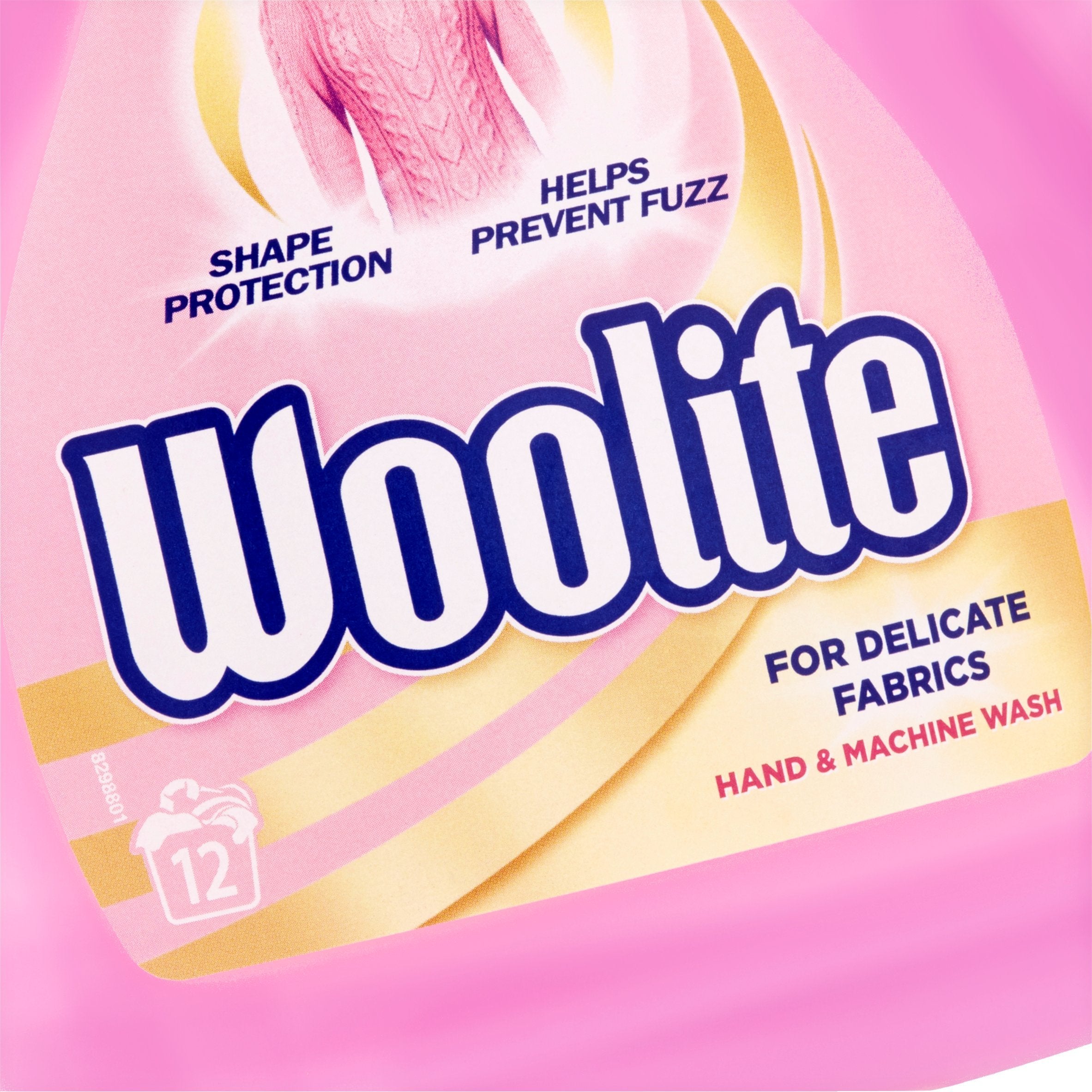 Woolite Hand Wash soft-lather close-up on fabric texture.