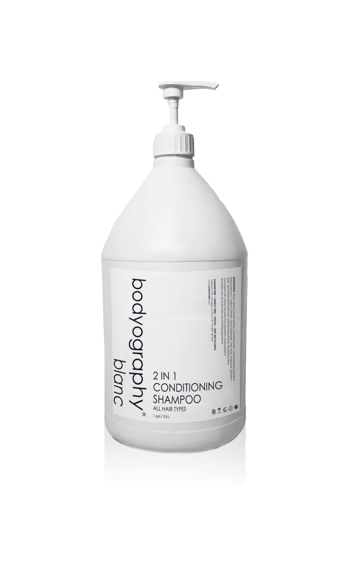 World Amenities Bodyography Blanc 2-in-1 shampoo bottle for smooth, frizz-free hair on the go.