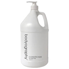 World Amenities Bodyography Blanc conditioner pump bottle for easy, mess-free application.