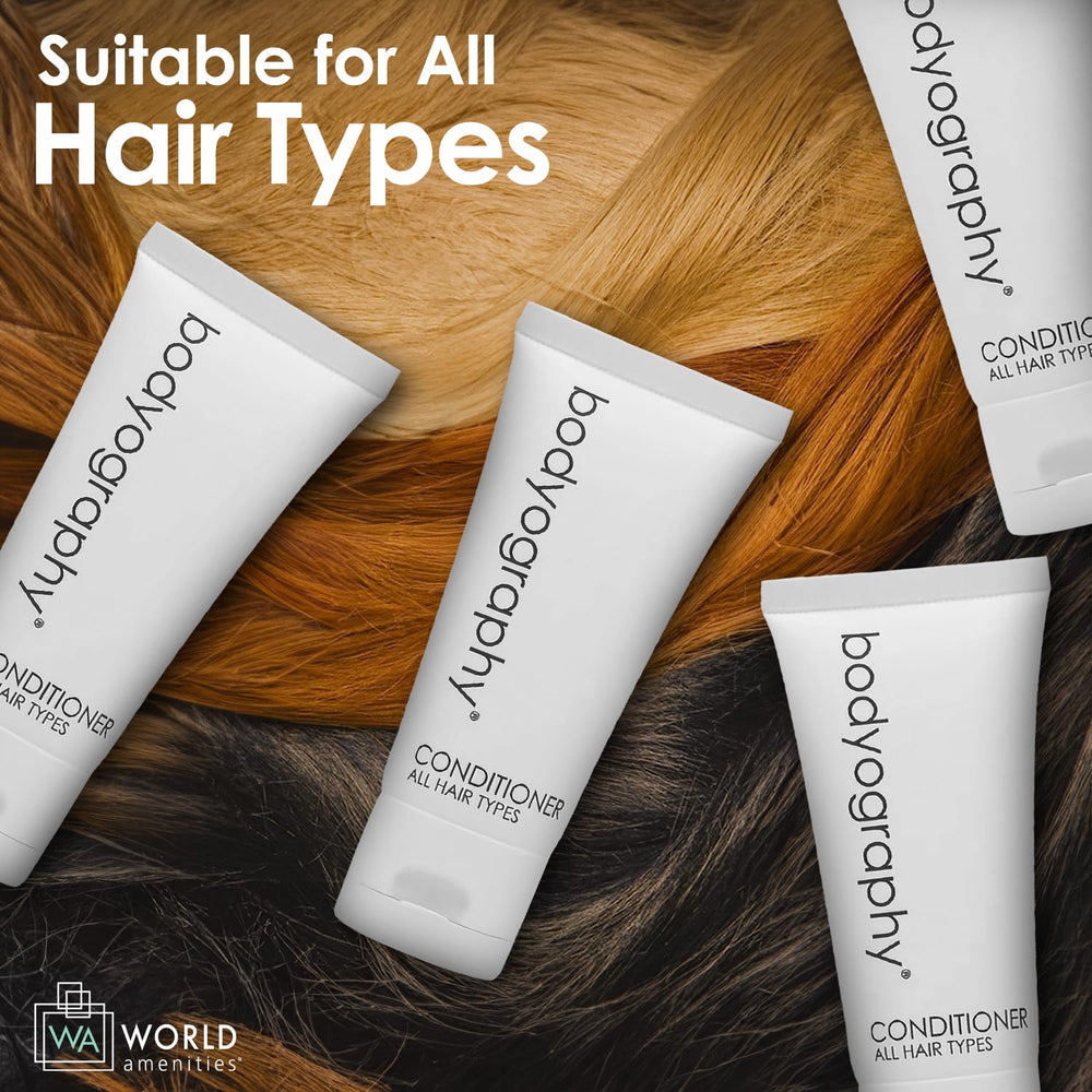World Amenities Bodyography Blanc bottle and tubes in a hotel bathroom setup