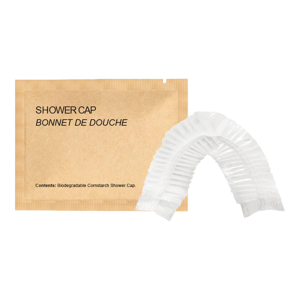 World Amenities kraft paper shower cap pack shown for eco-friendly travel