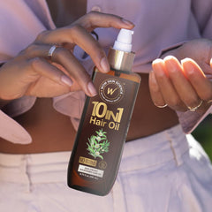 WOW Skin Science hair oil dropper in use for easy application