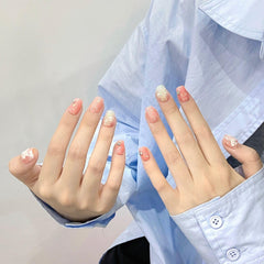 Wsiliana press-on nails in coffin shape with pink tips and 3D design detail