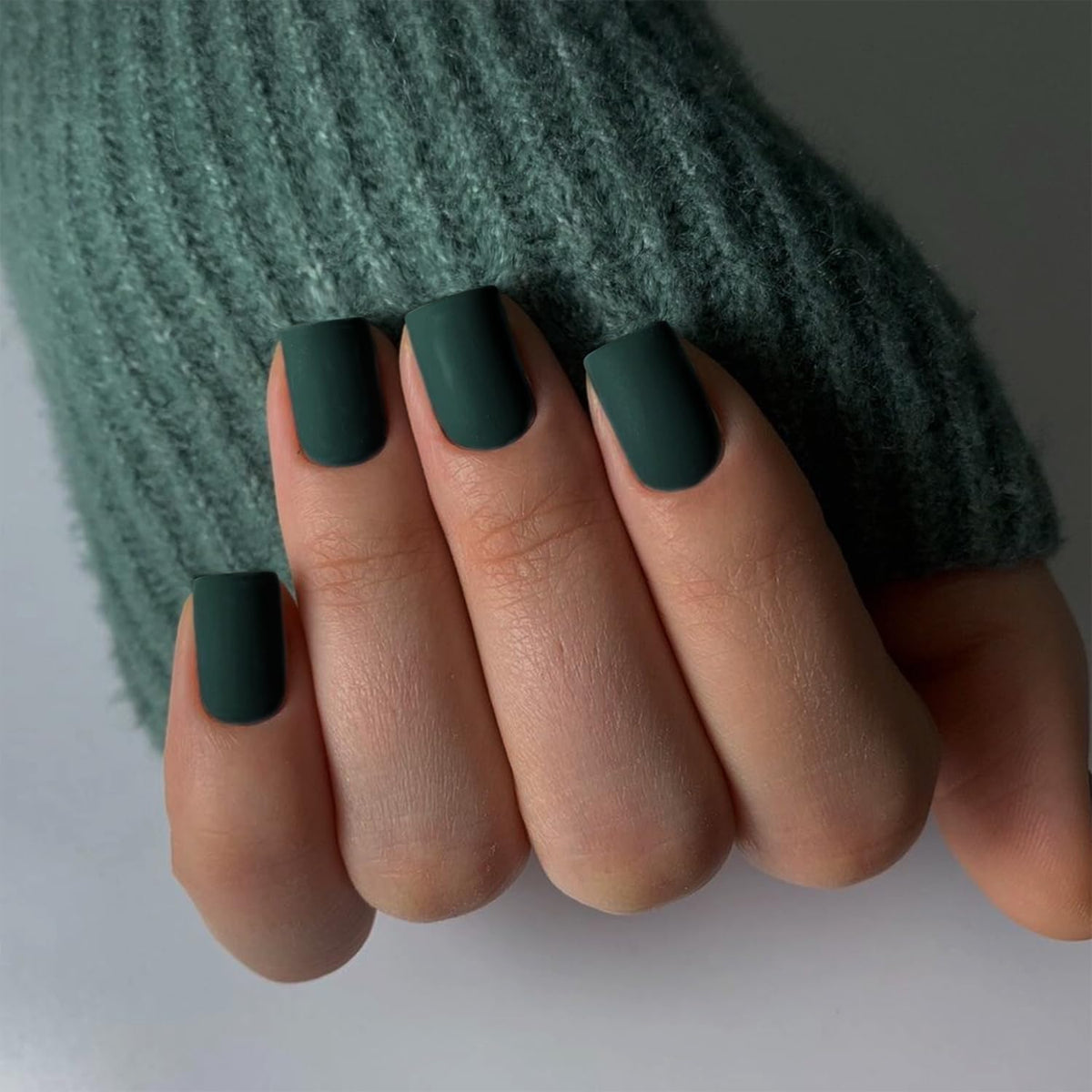 XCREANDO Matte Emerald Green press-on nails pack showing chic short square set for instant everyday style