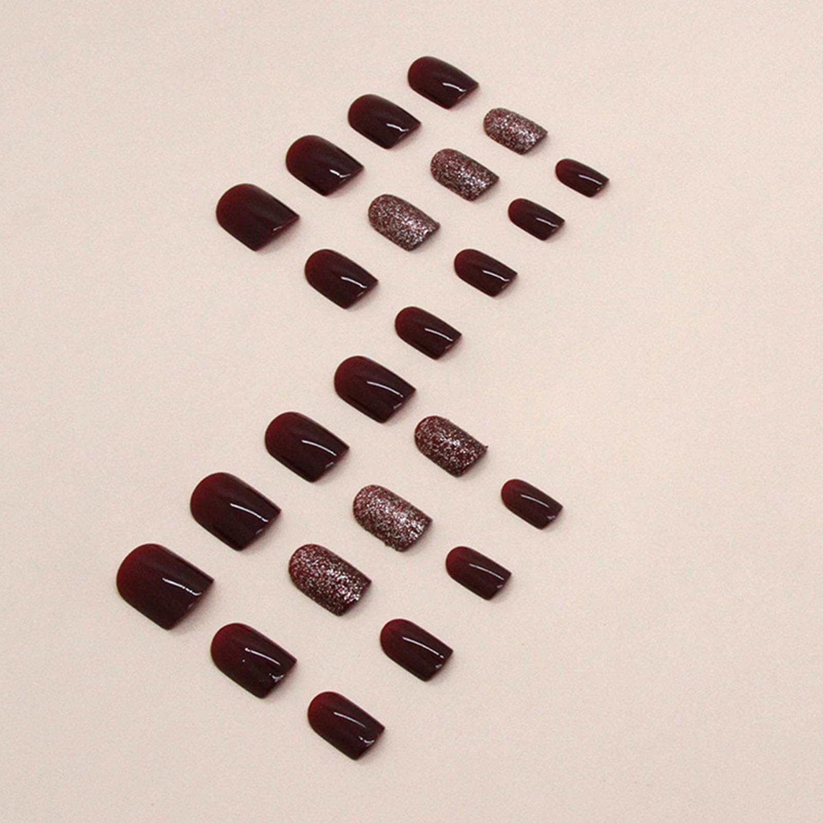 Xenophoer nails with gold glitter design, ideal for parties and events