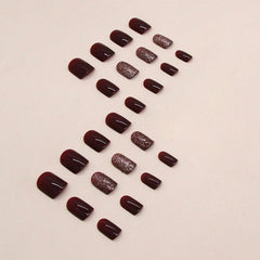 Xenophoer nails with gold glitter design, ideal for parties and events