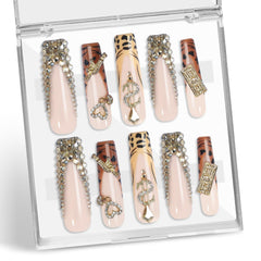XGV pink nails with rhinestones closeup for glamorous salon style finish