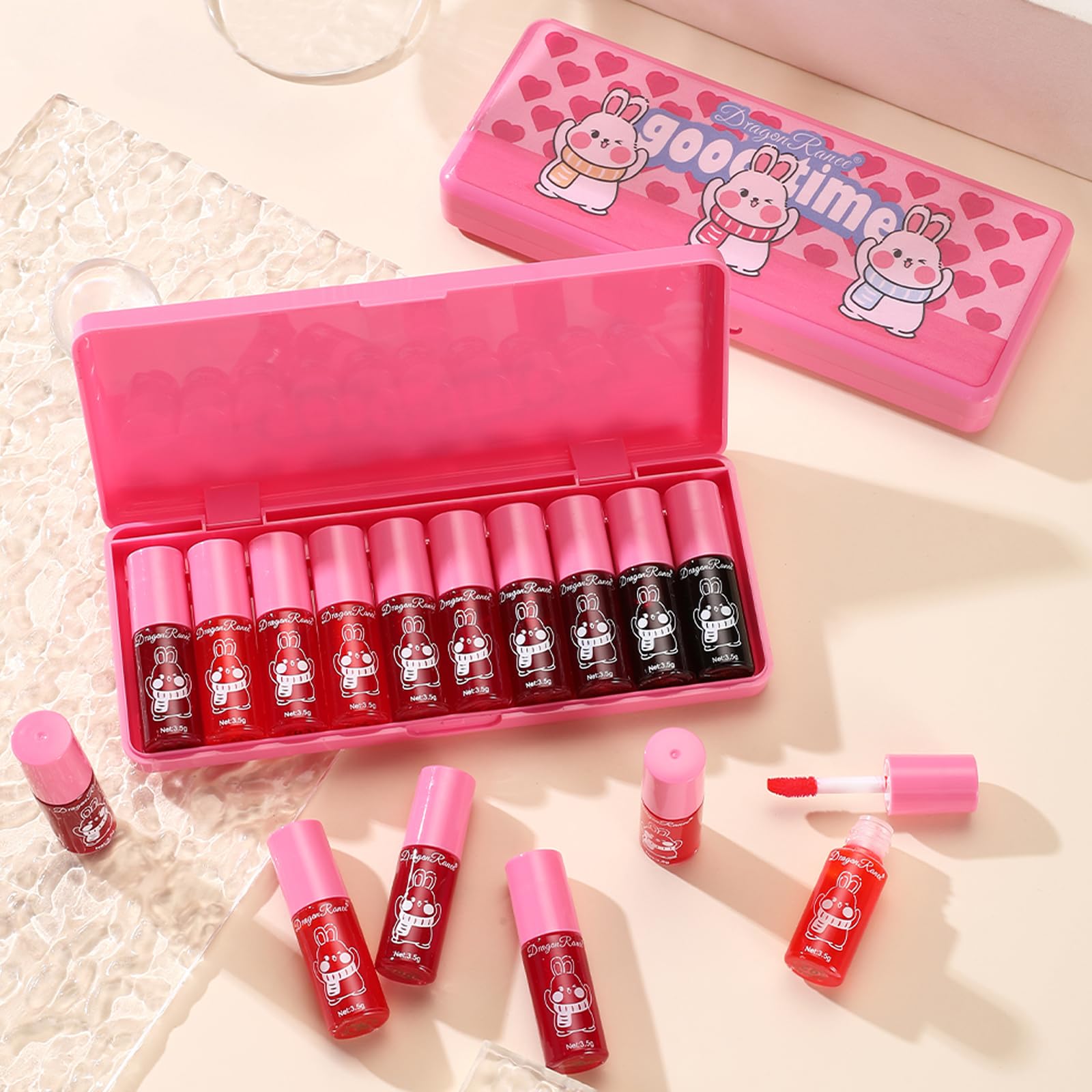 Xiuxixu lip tint bottle with a watery glass finish for luminous lips