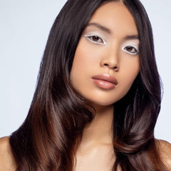 XMONDO Hair Forcefield sprayer application shows even mist for steady styling.