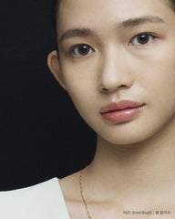 XOUL lip balm shell blush swatch reveals natural volume and radiant gloss.
