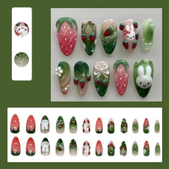 XUNCUNFAN almond medium nails close-up highlights 3D strawberry design for quick glam at home.
