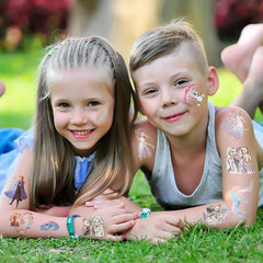XYLL tattoos applying on skin demonstrates quick, mess-free application during parties.
